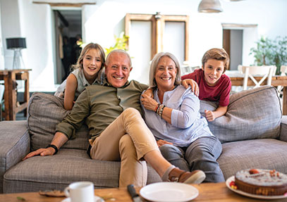 A family sitting on a couch. Links to Donor-Advised Fund A family sitting on a couch. Links to Donor-Advised Fund
